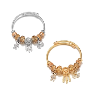 Adjustable cable charm bracelets with gold swan and silver bear pendants and crystal beads