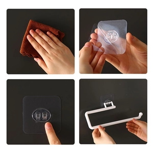 Adhesive white kitchen paper towel holder showing easy 4-step installation process