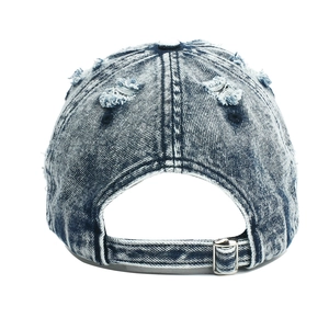 Back view of a washed blue distressed denim baseball cap with vintage ripped details