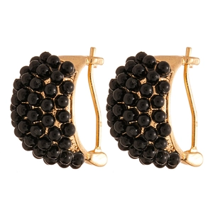 Vintage C-shaped gold hoop earrings with black resin beads for an elegant jewelry style