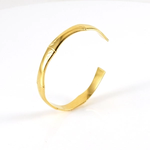 Bracelet jonc ouvert en acier inoxydable doré avec motif de bambou poli pour femme