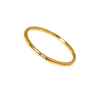 Minimalist gold titanium steel thin ring with a small sparkling cubic zirconia crystal