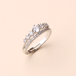 Macro shot of silver adjustable ring featuring multi-layer sparkling cubic zirconia pavé set