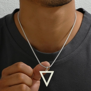 Close-up of men wearing a geometric triangle pendant necklace made of silver titanium steel