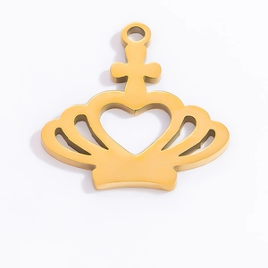 Close-up of 18k gold-plated crown pendant with heart cutout and cross detail