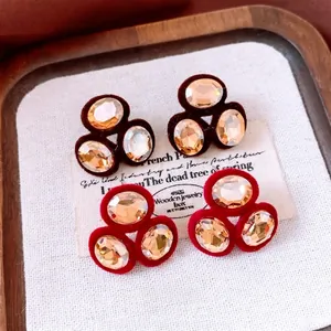 Oval crystal earrings with velvet trim in vintage brown and red, minimalist retro style