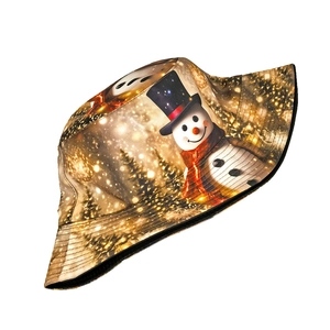 Detailed view of Christmas snowman patterns on foldable sun hat with warm gold prints