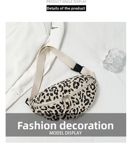 Detail view of woven leopard print waist bag with adjustable strap and double metal zippers