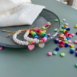 Handmade rainbow clay bead bracelets with freshwater pearls and heart charms