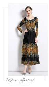 Vestido largo de encaje de manga larga con estampados florales naranjas y azules sobre negro