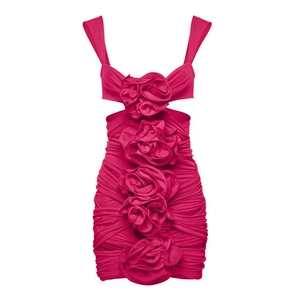 Detail of fuchsia mini dress featuring 3D floral rosettes and side cut-out design