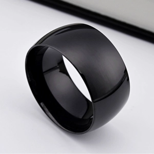 Polished 18K gold plated titanium wide ring with a sleek brushed black finish design