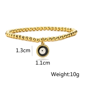 Close-up of gold beaded bracelet with evil eye pendant showing weight 10g and size 1.3cm