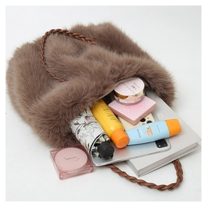 Large capacity brown faux fur tote bag showing interior storage for daily items