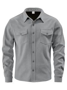 Close-up of the grey corduroy shirt collar and branded label showing 100% polyester
