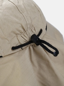Outdoor sun hat with ripstop fabric texture and adjustable black drawstring system