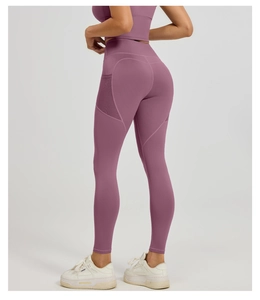 Side view of mauve yoga leggings featuring breathable mesh panels and high-waist fit