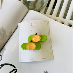 Barrettes à cheveux mignonnes avec kakis orange sur pinces à bec de canard laquées vertes