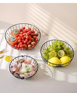 Three-piece black wire fruit basket set in minimalist metal design for home storage