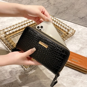 Classic black crocodile pattern long wallet with double zippers and gold metal trim
