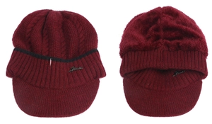 Detailed view of burgundy knit visor hat with thick faux fur lining and cable pattern