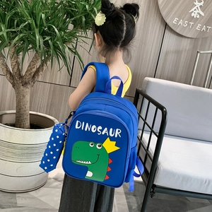 Blue dinosaur backpack for kids with a matching star-patterned pencil case pendant