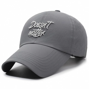 Dark grey quick-dry baseball cap with white Doesn't Matter embroidery and laser-cut vents
