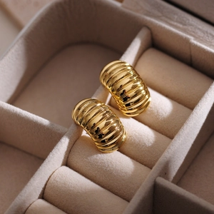 Fashionable gold plated stainless steel ribbed shell earrings with a vintage French style