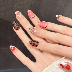 Pink and brown cherry leopard press-on nails in long almond shape with 3D floral accents