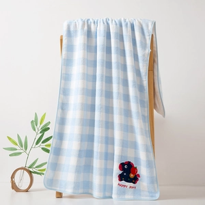 Close-up of blue and white checkered coral fleece towel with cute Happy Pony embroidery