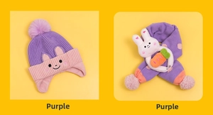Detail of purple knitted hat and scarf set with cute plush bunny holding a carrot