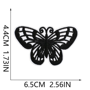 Detailed embroidery view of black and white butterfly patch with 6.5cm x 4.4cm size marks