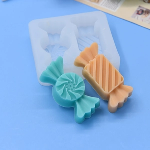 Candy shaped silicone mold for DIY baking with finished green and orange samples