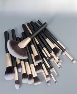 Macro shot of 24-piece professional matte black and rose gold makeup brush set details