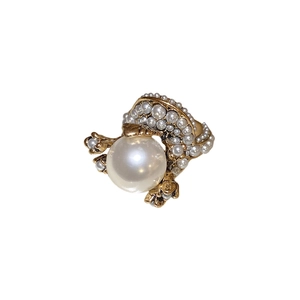 Vintage baroque flower ring featuring a large white pearl in a golden embossed setting