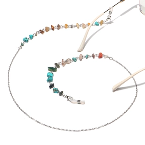 Detail showing colorful natural stones and silver alloy chain for glasses holder