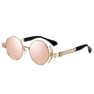 Steampunk round metal sunglasses with hollow carved temples and rose gold lenses