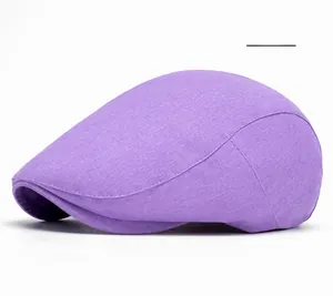Detailed macro shot of the purple flat cap showing its soft knitted texture and curved brim