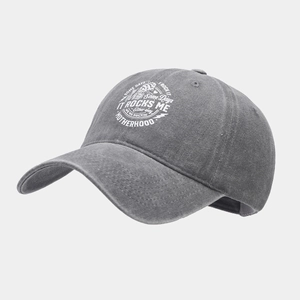 Detail of gray washed cotton baseball cap featuring white screen-printed motherhood text