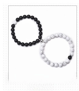Couples beaded bracelets with black lava stone, white turquoise, and magnetic charms