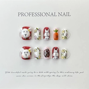 Detail of 10-piece handmade press-on nails featuring 3D white rabbit and floral designs