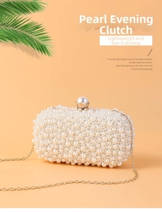 Detailed view of handmade pearl clutch bag with gold chain strap and elegant clasp
