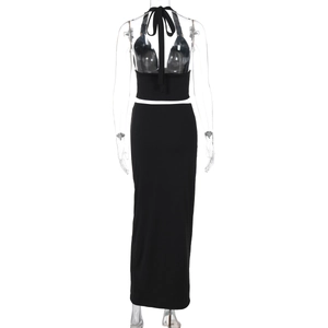 Back view of black halter backless crop top and slim fit maxi skirt two-piece set