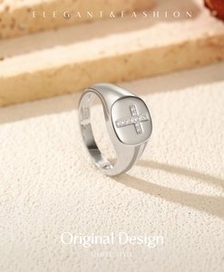 Detailed macro view of S925 sterling silver signet ring with micro-set cross pattern