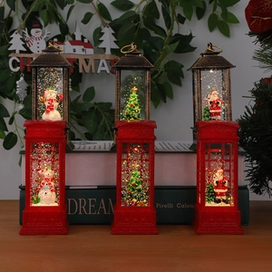 Lanterna natalizia a acqua luminosa e cabina telefonica con scene di Babbo Natale e pupazzo