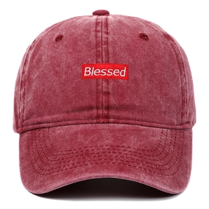 Vintage washed cotton baseball cap in burgundy with white Blessed embroidery patch