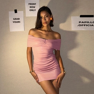 Detail view of pink sequined off-shoulder mini dress with elegant slim fit styling