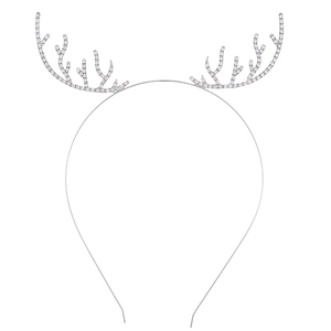 Detail shot of silver reindeer antler headband with sparkling rhinestone crystals
