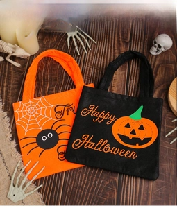 Halloween candy bags featuring festive pumpkin and spider designs for party gift packaging