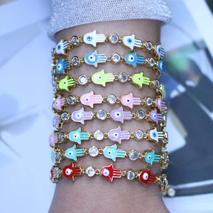 Bohemian colorful Hamsa Hand charm bracelets with gold chain and enamel details